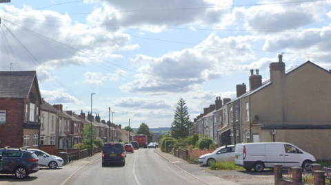 A Google Streetview of Williamthorpe Road shows terraced houses along the length of each side of the road. Traffic is queuing.