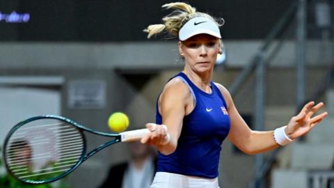 Katie Boulter hits a forehand
