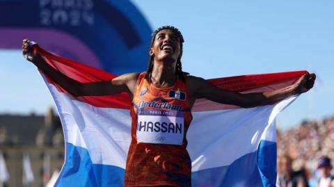 Sifan Hassan celebrates winning Olympic gold in the women's marathon