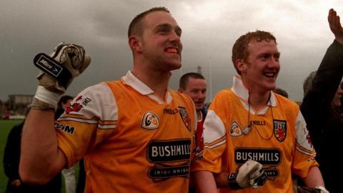 Joe Quinn and Tony Convery celebrate Antrim's win over Down in 2000