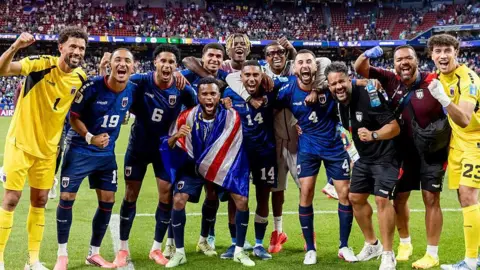 Cape Verde players celebrate reaching World Cup last 32
