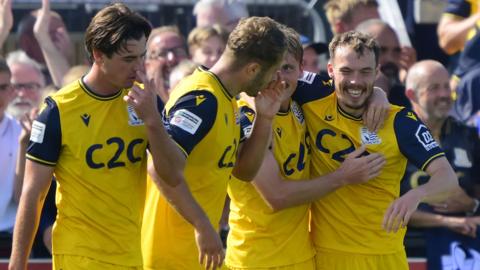 Southend United players celebrate a goal