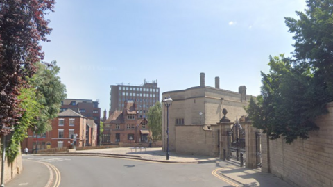 A Google Streetview showing Lenton Road with the entrance to Nottingham Castle on the right.