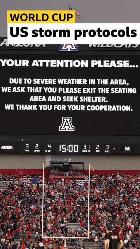 A billboard at the Arizona NFL Stadium displaying a severe weather warning message.
