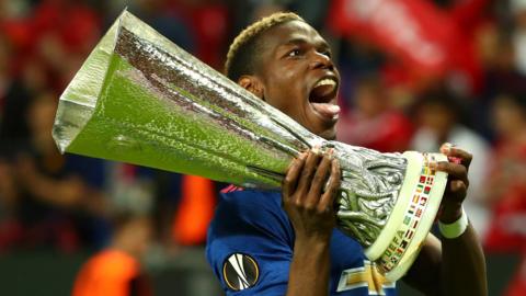 Manchester United's Paul Pogba with the Europa League trophy in 2017