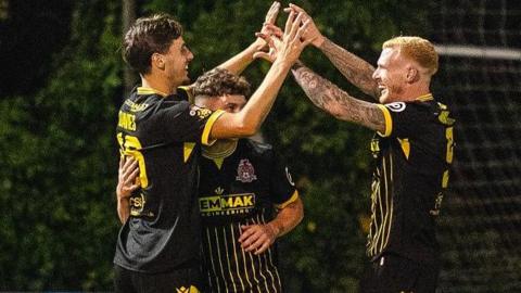 Briton Ferry Llansawel celebrate Ruben Davies' goal