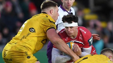 Tom Rogers carries the ball for Scarlets against Dragons