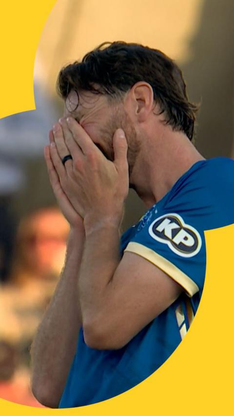 Richard Gleeson buries his head in his hands in disappointment