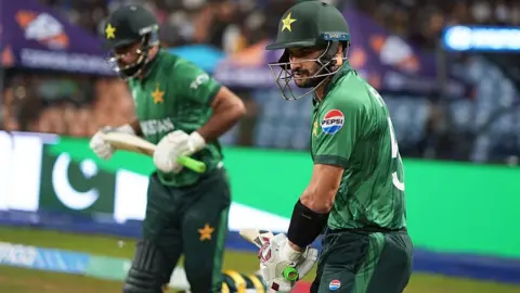 Fakhar Zaman and Sahibzada Farhan of Pakistan make their way out to bat during the ICC Men's T20 World Cup India & Sri Lanka 2026 Super 8 match between Sri Lanka and Pakistan at Pallekele Cricket Stadium