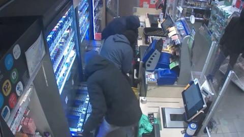 Four men robbing a shop