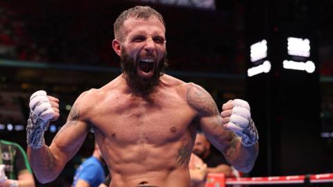 Cacace celebrates his win over Warrington in the ring