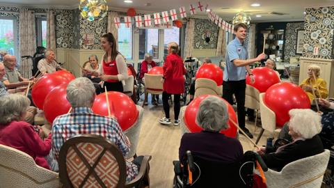 Residents during the drumfit session