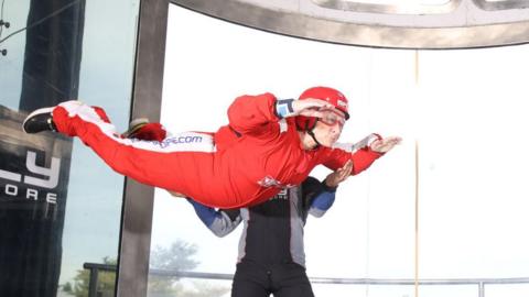 Patricia Denton in an indoor skydiving centre