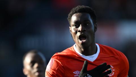 Elijah Adebayo stars for Luton to thrust them to sixth place in the Championship table.