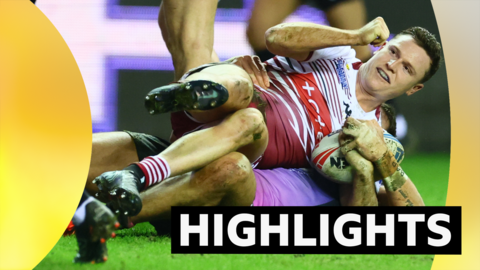 Jai Field celebrates scoring Wigan's fourth try against Hull FC