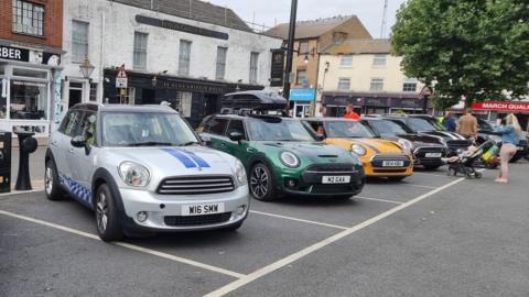 A line of Minis on Market Square in March