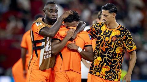 Justin Kluivert is consoled after he missed a penalty for the Netherlands in the penalty shootout against Morocco