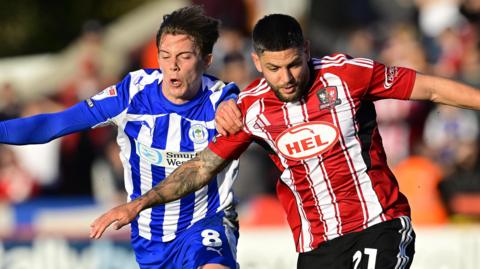 Action from Exeter City v Wigan