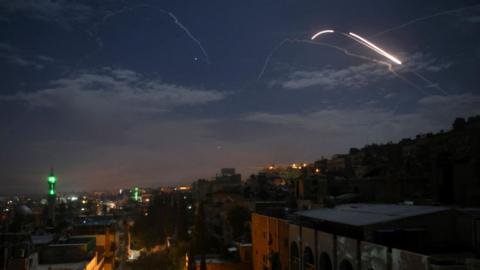 Syrian air defence batteries respond to what the Syrian state media said were Israeli missiles targeting Damascus in January 2019