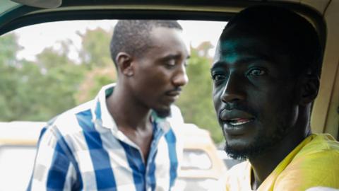 Man in a fuel queue