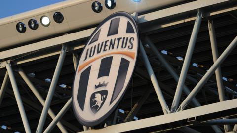 Juventus badge at the club's stadium