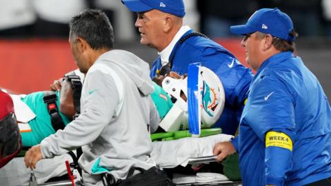 Tua Tagovailoa is taken off on a stretcher against Cincinnati