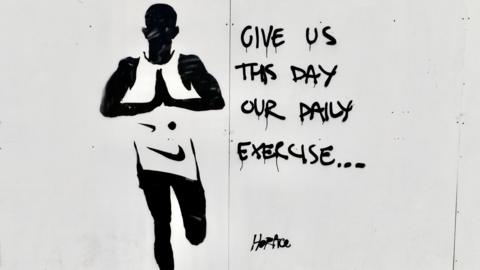 'Give us this day our daily exercise' graffiti