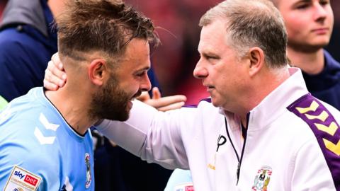 Coventry striker Matt Godden and boss Mark Robins