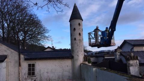 Contractors unblocking the dovecote