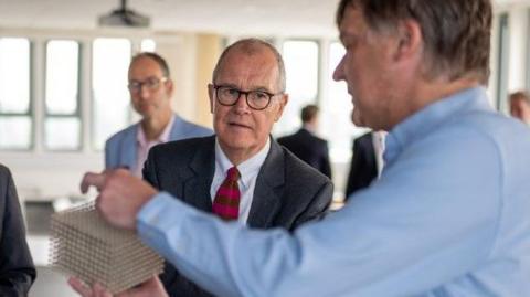 Professor Alastair Hibbins (right), who will lead the MetaHub collective, with Lord Vallance at the University of Exeter