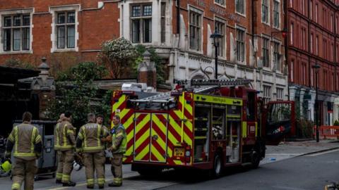 Firefighters attend the scene of a fire at the Chiltern Firehouse hotel in London, Britain, February 15, 2025