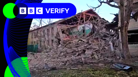 A screengrab from a video showing part of an apartment's walls has collapsed following an overnight Russian attack