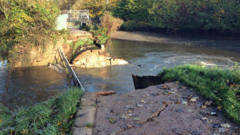 The Tumbling Bay Weir bridge, over the River Wey, in Guildford