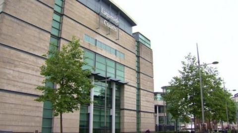 It shows Laganside Courts complex in Belfast with trees outside