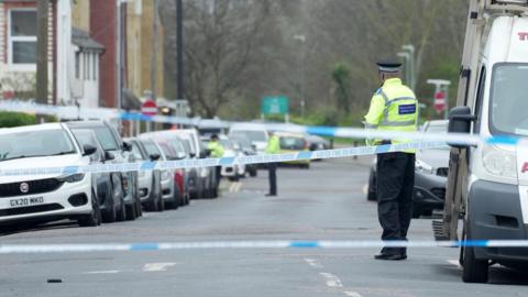 Police at the scene in Station Road, Portslade