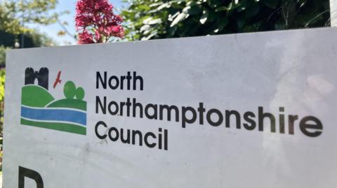 A close up of the North Northamptonshire Council sign.
