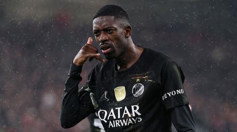 PSG's Ousmane Dembele celebrates scoring against Liverpool at Anfield