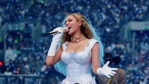 Beyoncé close-up in an all-white outfit