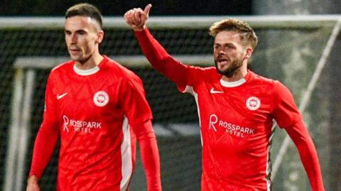 Andy Ryan celebrates scoring for Larne
