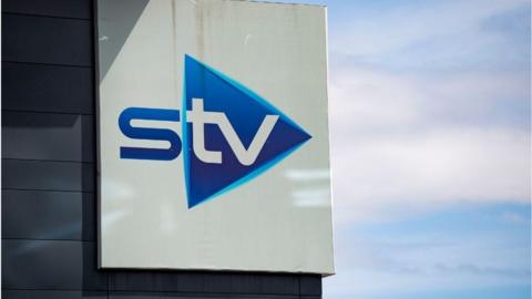 A general view of the STV sign on its Glasgow headquarters on a sunny day.