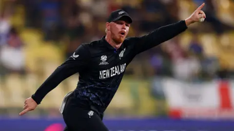 Glenn Phillips celebrates the catch of Jacob Bethell