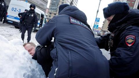 A man being arrested in Moscow