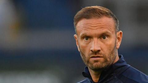 Bolton Wanderers' Manager Ian Evatt during the Bristol Street Motors Trophy Group D match between Barrow and Bolton Wanderers 