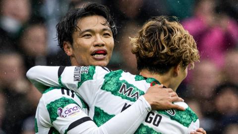 Celtic players Reo Hatate and Kyogo Furuhashi celebrate