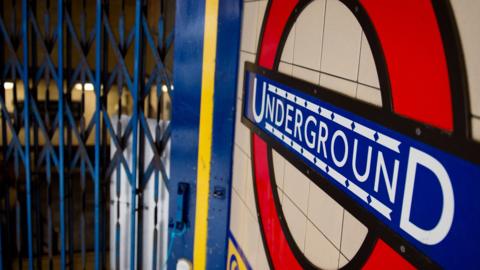 The gates to a closed Tube station