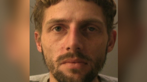 A police image of Lee Parnaby, of Terminus Road in Eastbourne, is now subject to a Criminal Behaviour Order after Sussex Police made an application in a bid to prevent further offending.