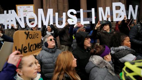 Demonstrators spell out "# No Muslim Ban" during the "Boston Protest Against Muslim Ban and Anti-Immigration Orders" to protest