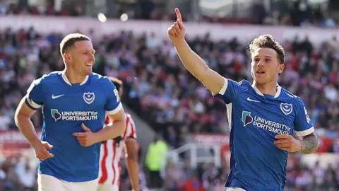 Portsmouth's Adrian Segecic celebrates scoring at Stoke