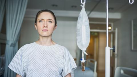 File picture of woman in hospital