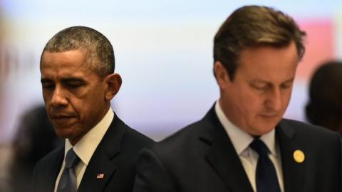 Obama and Cameron looking in opposite directions
